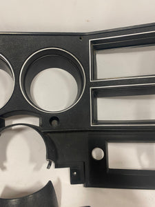 1984-1987 Good Used dash bezel, black with silver trim