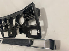 Load image into Gallery viewer, 1984-1987 Good Used dash bezel, black with silver trim; New AC vent, and passenger side plate